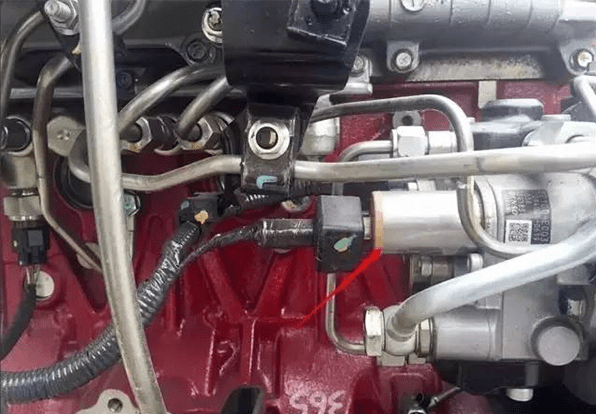 SCV valve location on the KOBELCO excavator engine